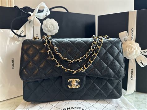 chanel maxi caviar flap bag price|Maxi classic handbag, Grained calfskin & gold.